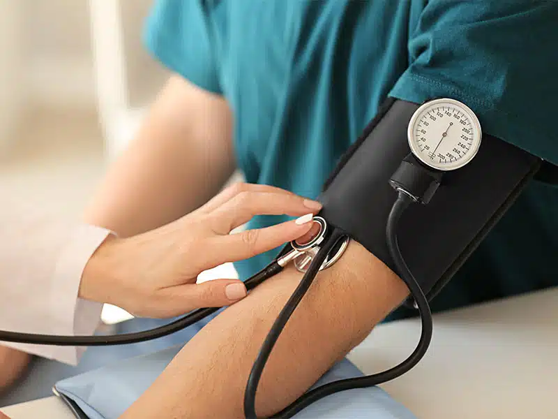 nurse taking a patient's blood pressure during medically supervised detox for alcoholism